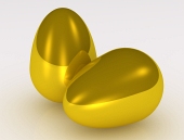 Dos huevos dorados sobre fondo blanco