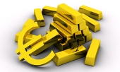 Lingots d'or et symbole de l'EURO doré