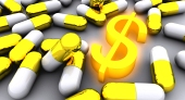 Многие золотые таблетки со светящимся символом золотого доллара